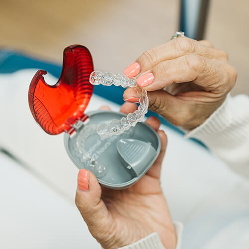 handsholdingInvisalign Gig Harbor Orthodontics